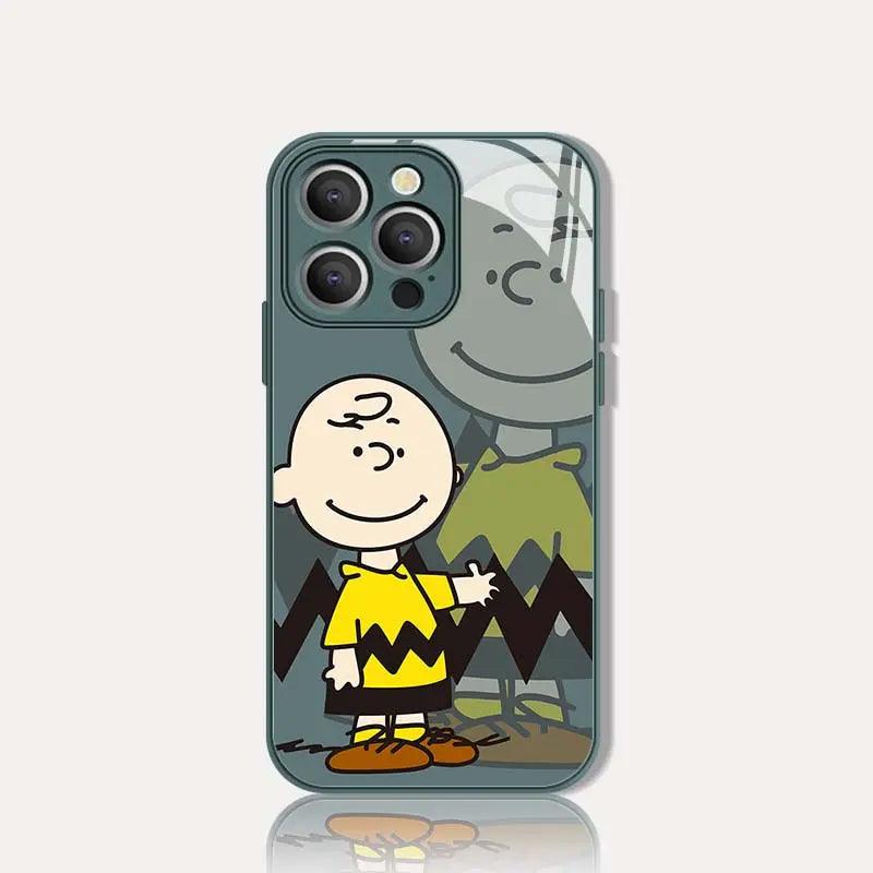 Charlie Brown phone case featuring the character in his iconic yellow shirt with black zigzag, waving hello with a smile.  The gray background subtly shows another Peanuts character, perfect for cartoon fans.