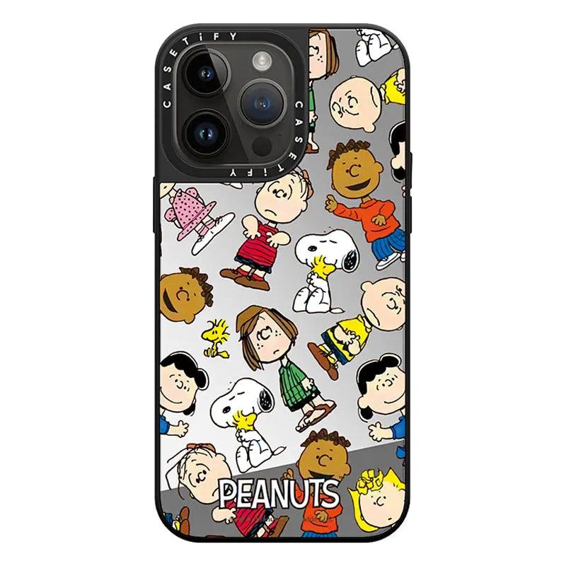 Vibrant Peanuts cartoon phone case featuring the beloved characters in an anime style. The case is held up for display, showing Snoopy, Charlie Brown and Lucy distributed across the black-bordered design.