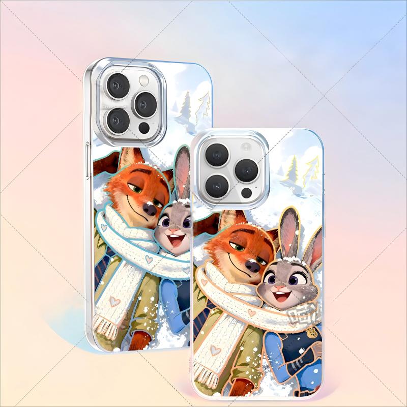  Zootopia winter phone case featuring Nick and Judy hugging in snow with scarves. Snowflakes fall around the characters against a soft blue background with bare trees, perfect for iPhone.